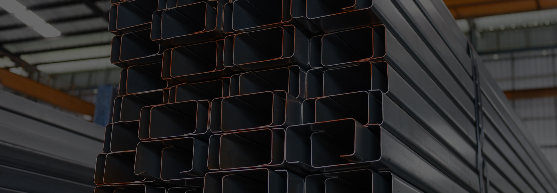 Stacked steel sections in storage