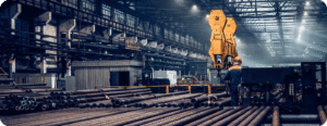 Molten metal being poured inside a steel mill